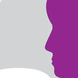 GettyImages-1315539697 A cropped photo of two notebooks stacked on top of each other. The top notebook has blank pages with a red fabric bookmark and a pen is laid on top of them.